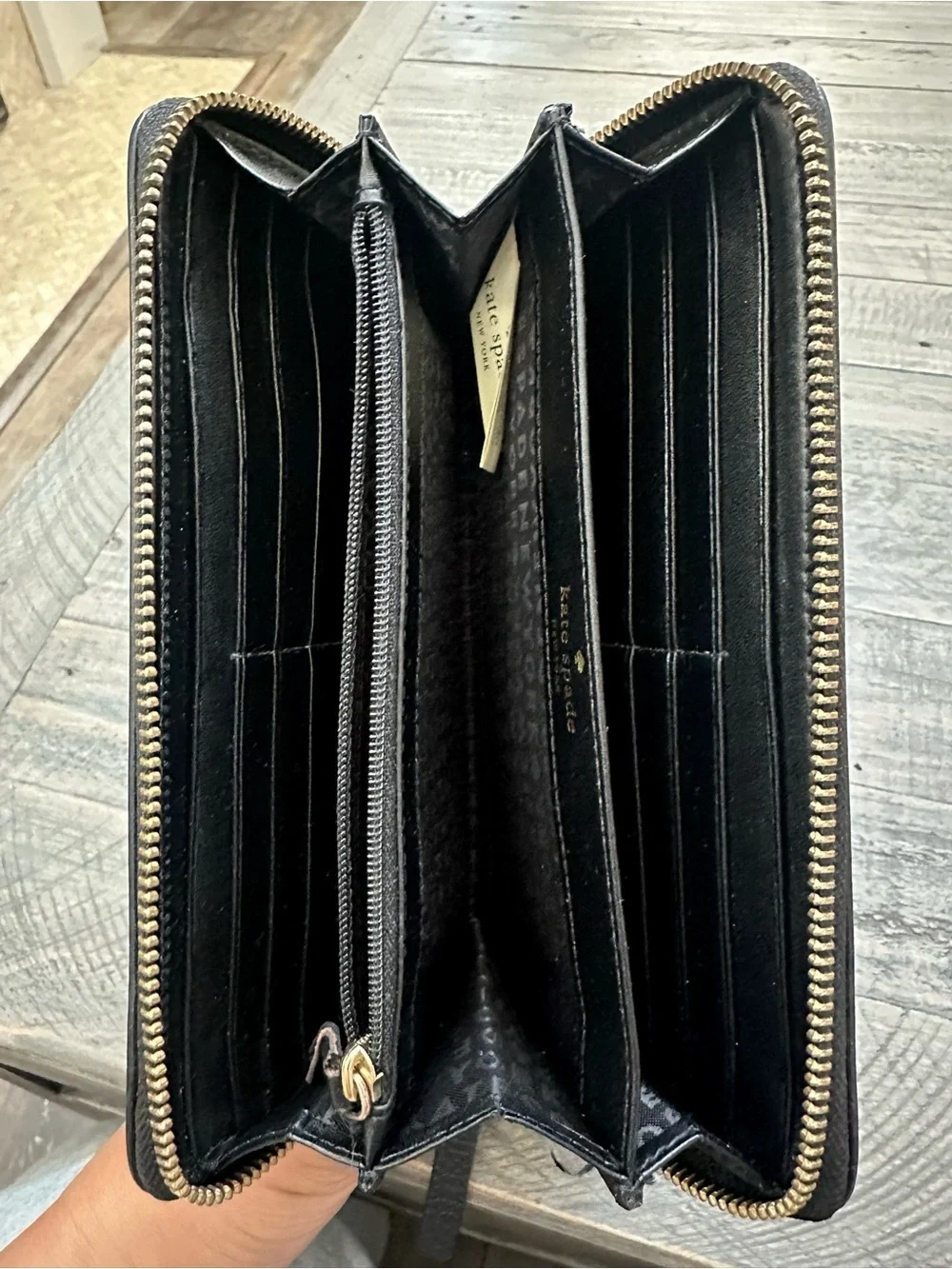 Kate Spade Black Pebbled Leather Tassel Zip Wallet with Gold Hardware
